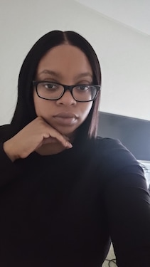 Fast delivery. Picture of hair straight from package no wig cap or makeup. I usually don't wear black hair but I decided to switch up. Great for daily wear.