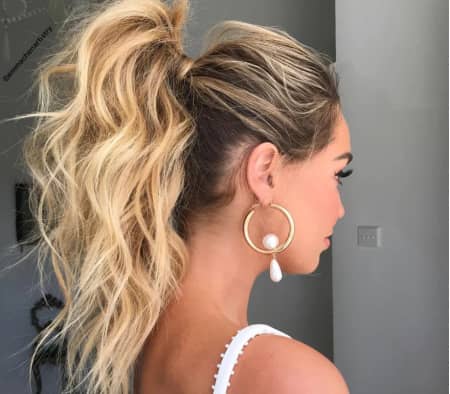 Curly and Voluminous High Ponytail