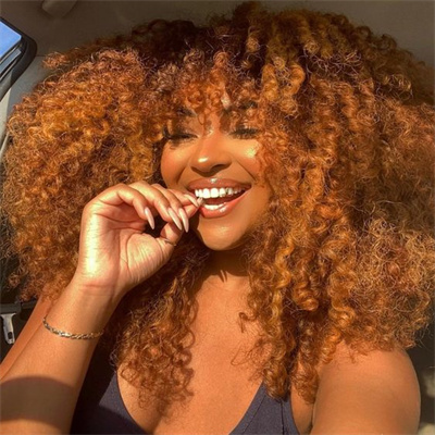 Ginger brown kinky curly hair