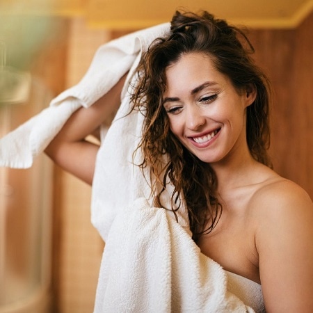 a-girl-is-towel-drying-her-hair