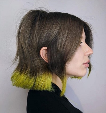 black and yellow-green dip dye hair