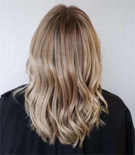 blonde-balayage-with-chestnut-root-smudges