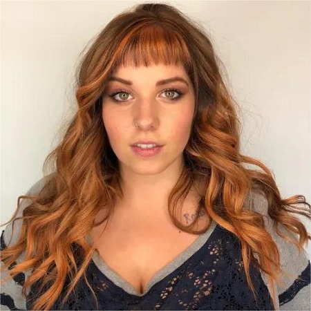 long sultry waves with micro bangs