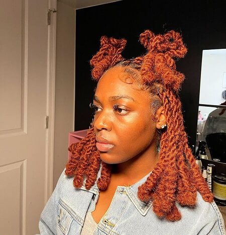 red invisible locs topknot
