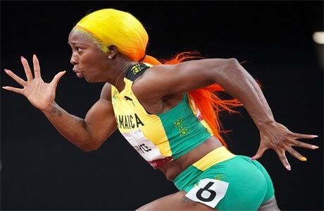 shelly-ann-fraser-pryce-yellow-and-orange-ombre-ponytail