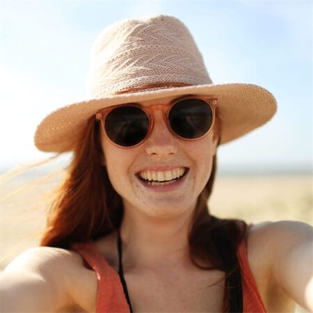 wear-a-hat-to-protect-hair-from-sun-damage